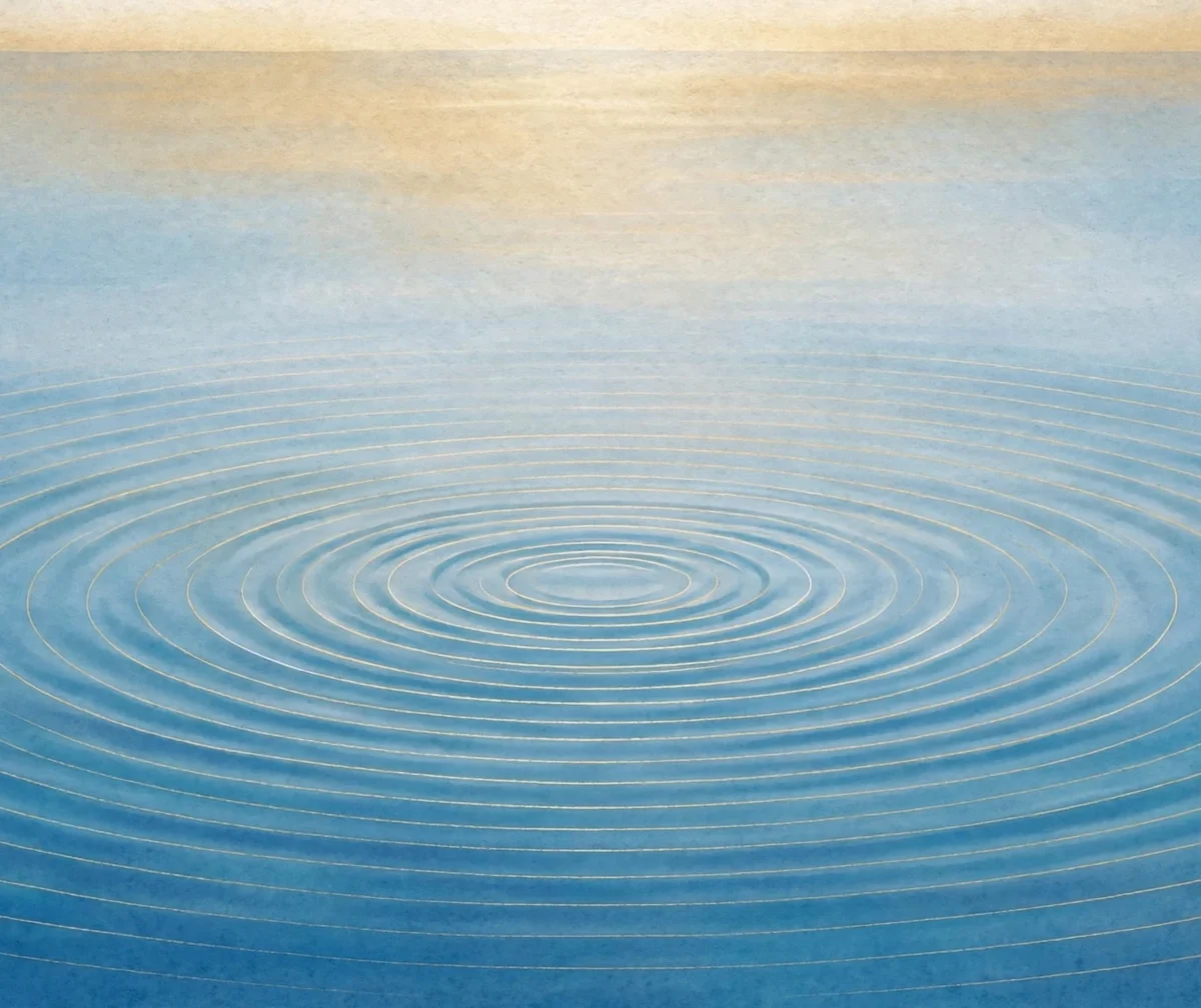Calm ocean waves at dawn with concentric ripples, symbolizing slow rhythmic deep breathing exercises